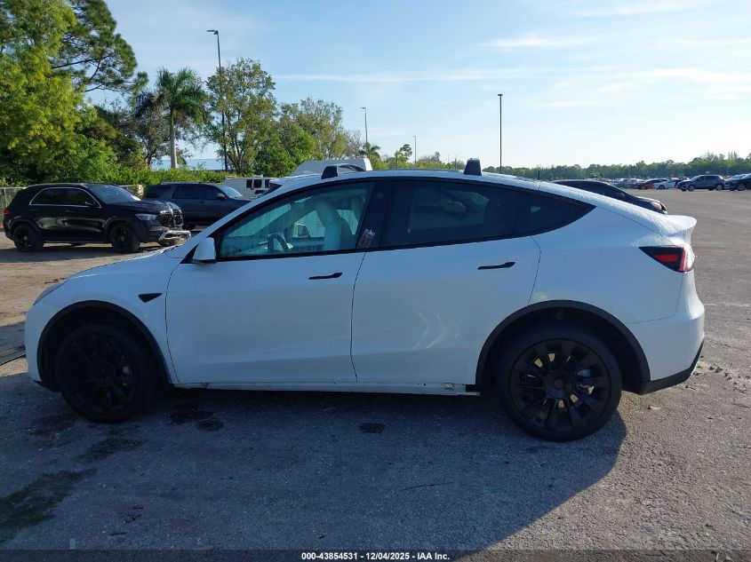 2023 Tesla Model Y Awd/Long Range Dual Motor All-Wheel Drive VIN: 7SAYGAEE2PF640590 Lot: 43854531