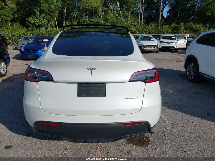 2023 Tesla Model Y Awd/Long Range Dual Motor All-Wheel Drive VIN: 7SAYGAEE2PF640590 Lot: 43854531