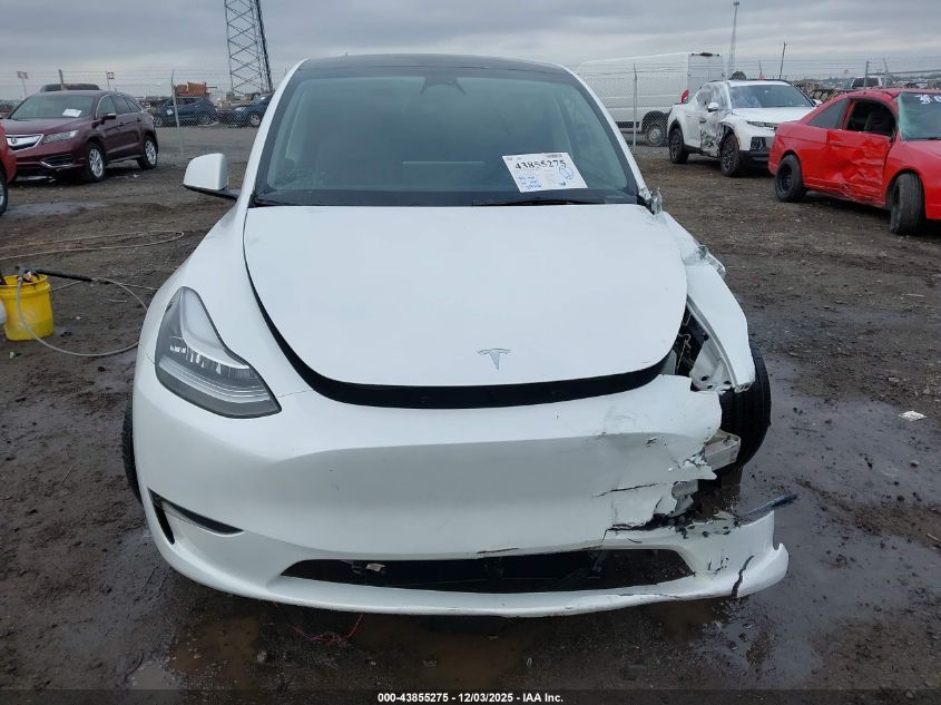 2023 Tesla Model Y Awd/Long Range Dual Motor All-Wheel Drive VIN: 7SAYGDEE4PA123306 Lot: 43855275