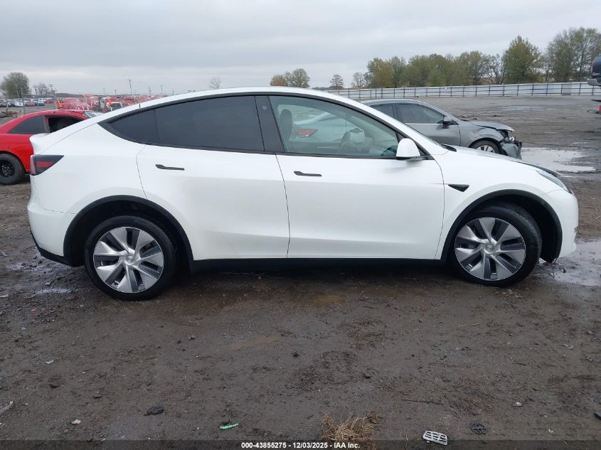 2023 Tesla Model Y Awd/Long Range Dual Motor All-Wheel Drive VIN: 7SAYGDEE4PA123306 Lot: 43855275