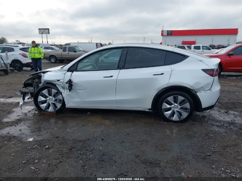 2023 Tesla Model Y Awd/Long Range Dual Motor All-Wheel Drive VIN: 7SAYGDEE4PA123306 Lot: 43855275