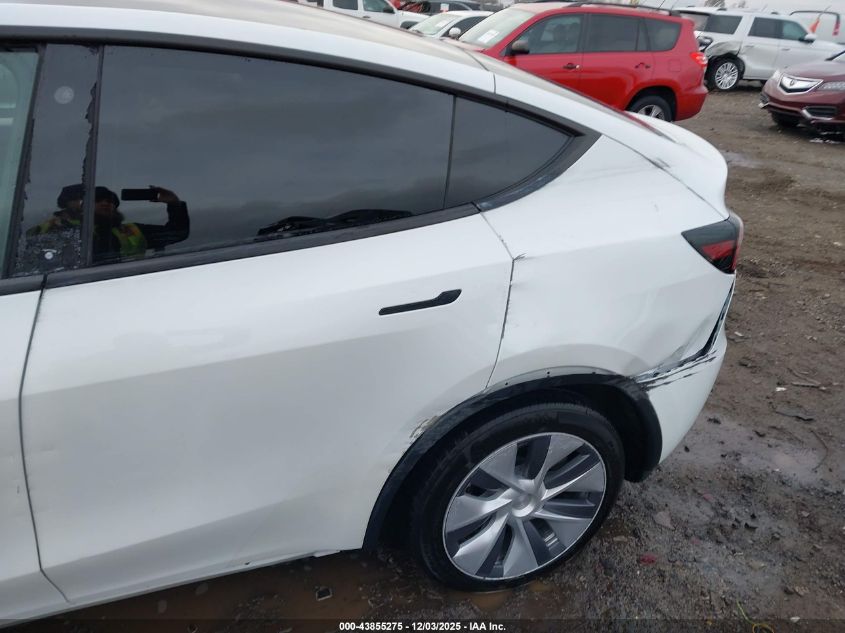 2023 Tesla Model Y Awd/Long Range Dual Motor All-Wheel Drive VIN: 7SAYGDEE4PA123306 Lot: 43855275