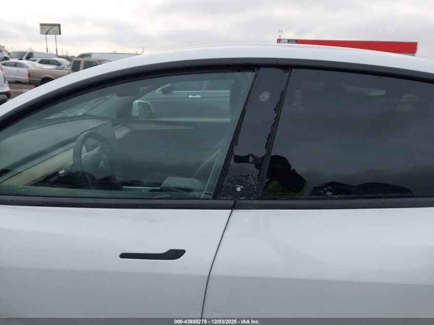 2023 Tesla Model Y Awd/Long Range Dual Motor All-Wheel Drive VIN: 7SAYGDEE4PA123306 Lot: 43855275