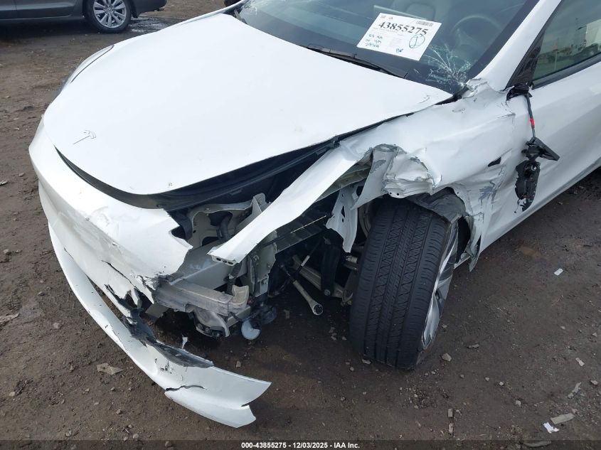 2023 Tesla Model Y Awd/Long Range Dual Motor All-Wheel Drive VIN: 7SAYGDEE4PA123306 Lot: 43855275