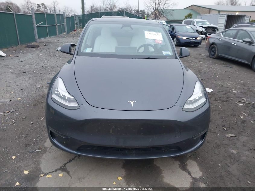 2023 Tesla Model Y Awd/Long Range Dual Motor All-Wheel Drive VIN: 7SAYGDEE7PA147714 Lot: 43856635