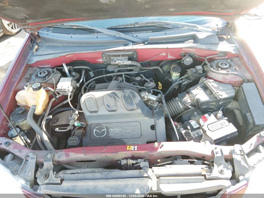 2003 Mazda Tribute Lx V6 VIN: 4F2YZ04173KM06281 Lot: 43858148