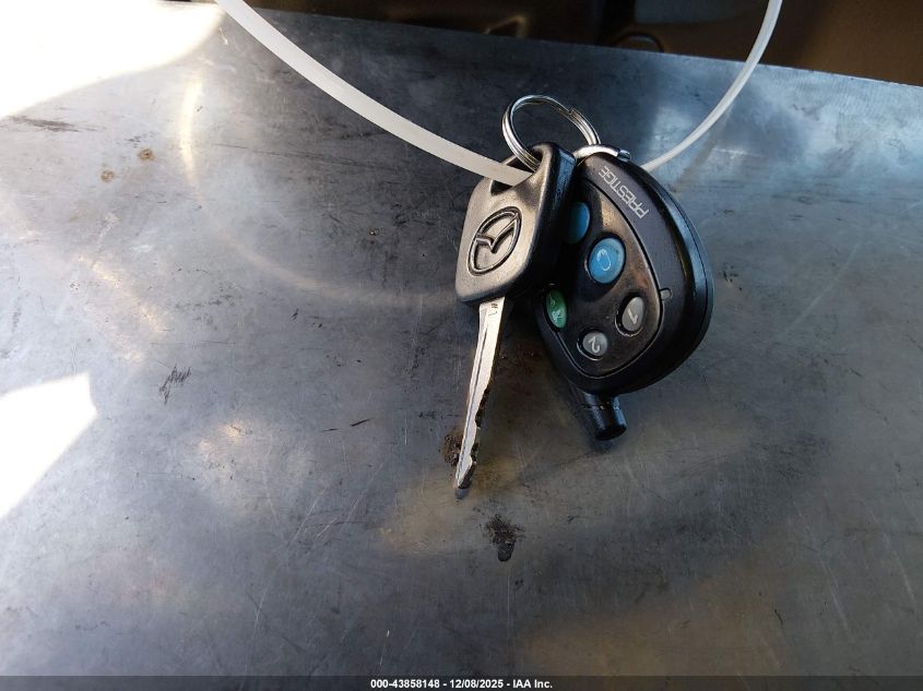 2003 Mazda Tribute Lx V6 VIN: 4F2YZ04173KM06281 Lot: 43858148