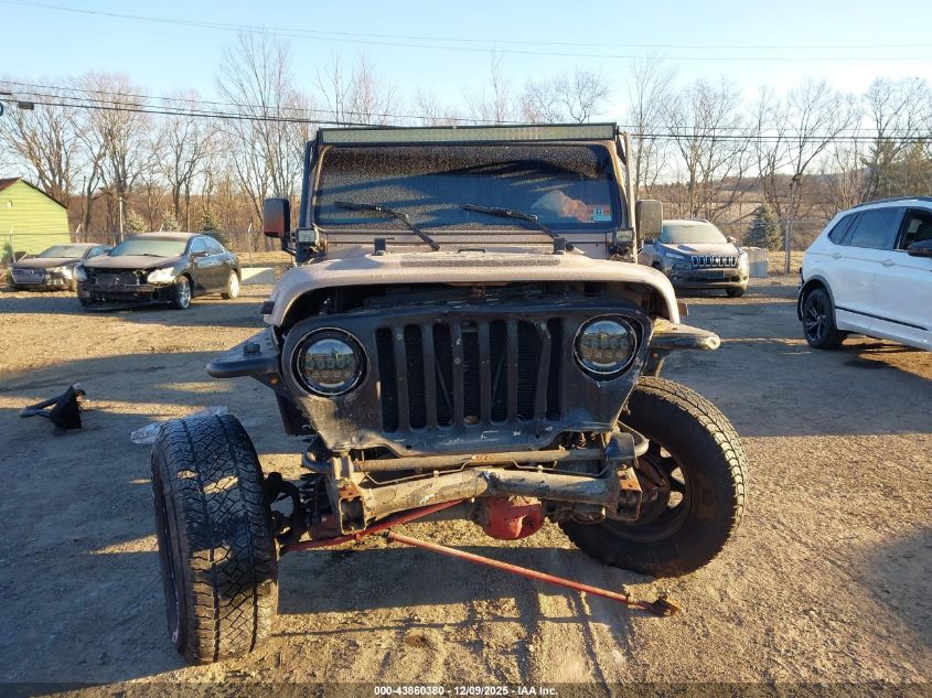 2000 Jeep Wrangler Sahara VIN: 1J4FA59S0YP780538 Lot: 43860380