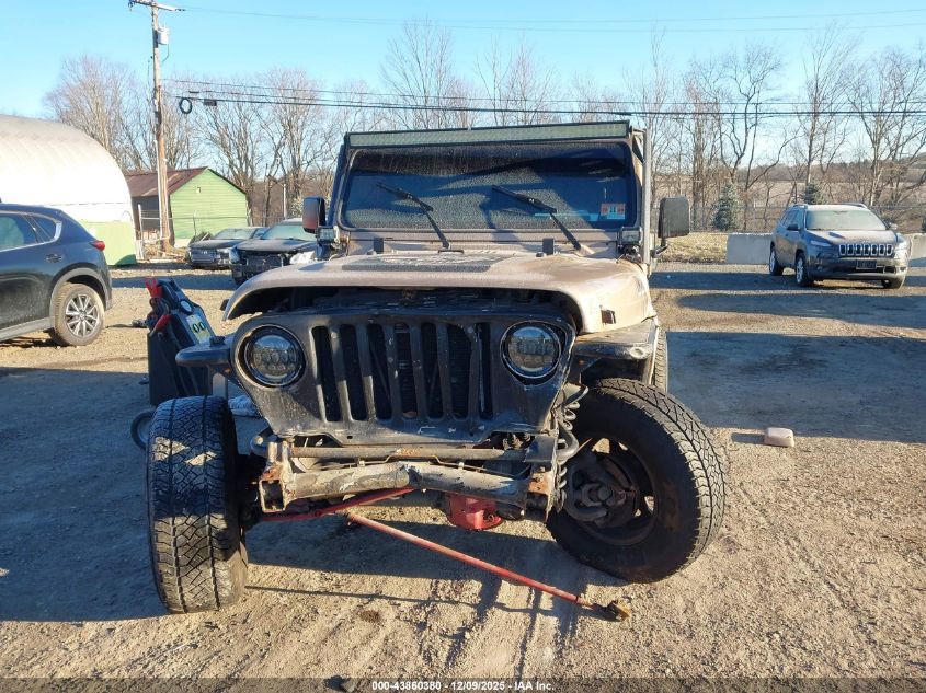 2000 Jeep Wrangler Sahara VIN: 1J4FA59S0YP780538 Lot: 43860380