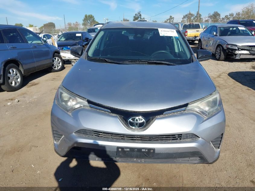 2018 Toyota Rav4 Le VIN: 2T3ZFREV6JW461697 Lot: 43860709