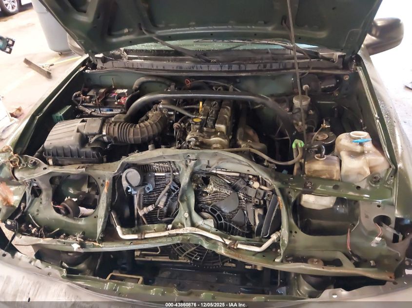 2000 Chevrolet Tracker Hard Top VIN: 2CNBJ13C5Y6907097 Lot: 43860876