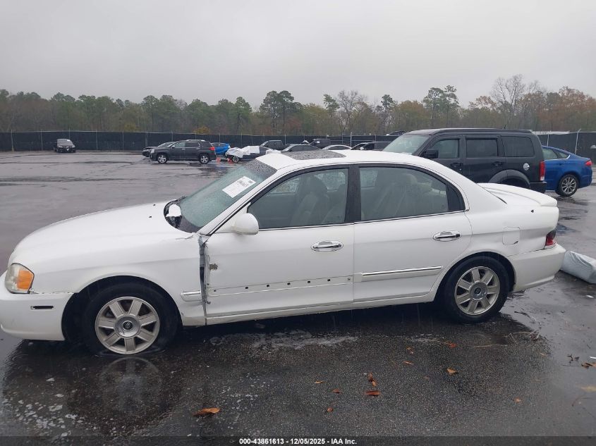 2003 Kia Optima Lx V6/Se V6 VIN: KNAGD128735236273 Lot: 43861613