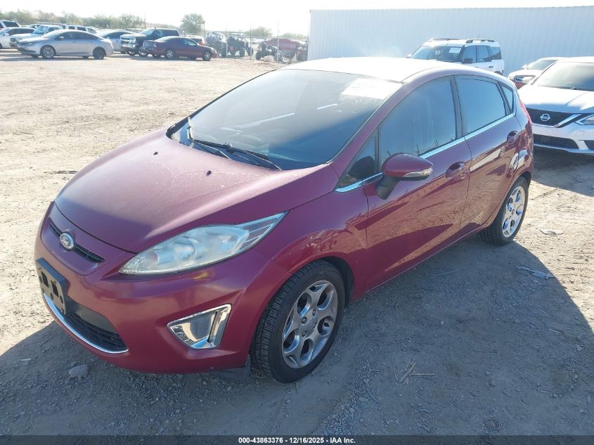 2011 Ford Fiesta Ses VIN: 3FADP4FJXBM165175 Lot: 43863376