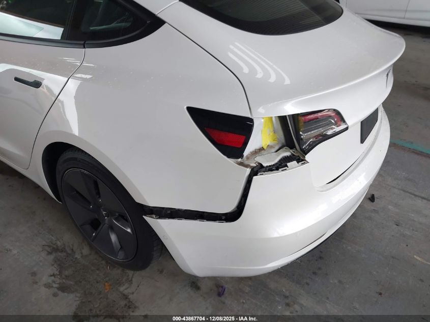 2021 Tesla Model 3 Standard Range Plus Rear-Wheel Drive VIN: 5YJ3E1EA1MF977497 Lot: 43867704