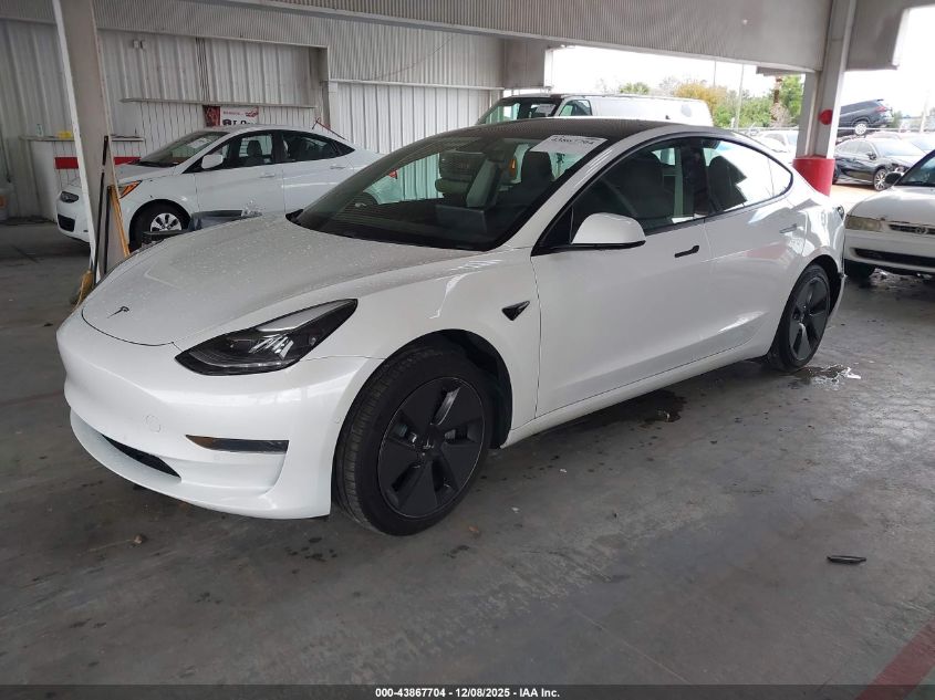 2021 Tesla Model 3 Standard Range Plus Rear-Wheel Drive VIN: 5YJ3E1EA1MF977497 Lot: 43867704