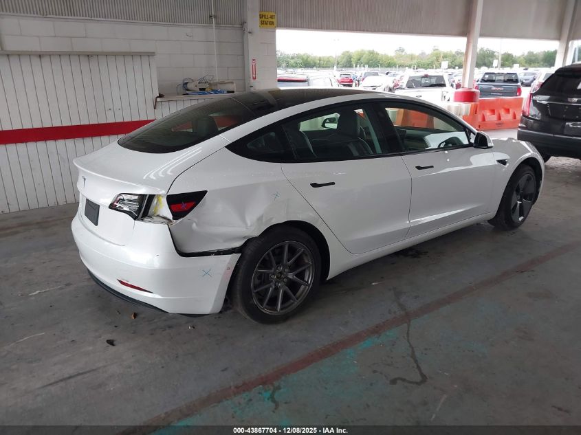 2021 Tesla Model 3 Standard Range Plus Rear-Wheel Drive VIN: 5YJ3E1EA1MF977497 Lot: 43867704