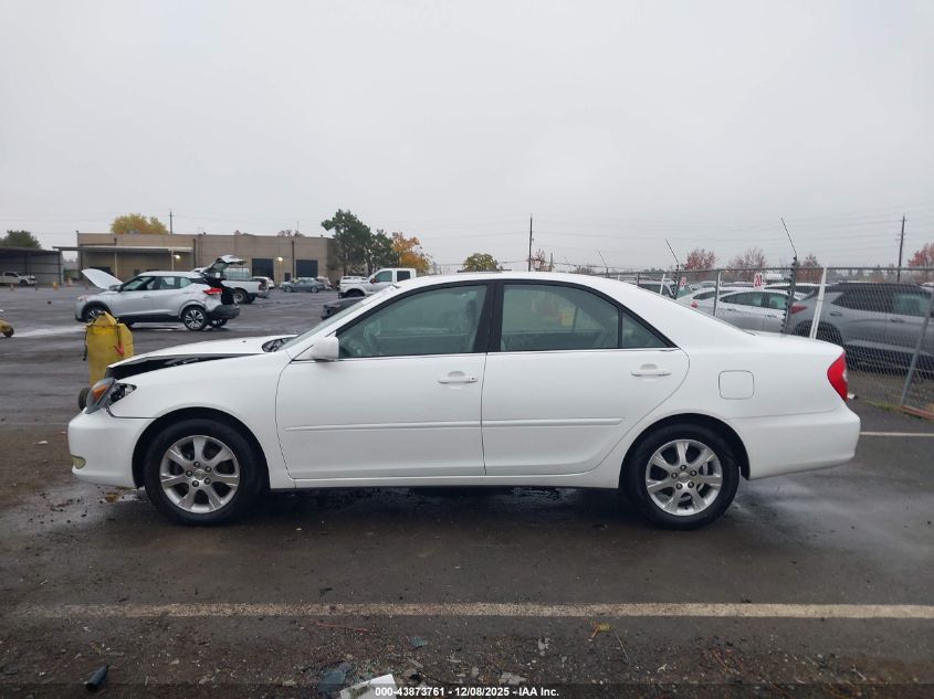 2004 Toyota Camry Le VIN: JTDBE30K240263187 Lot: 43873761