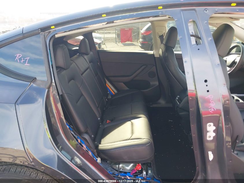 2025 Tesla Model Y Long Range Dual Motor All-Wheel Drive VIN: 7SAYGDEE6SF318500 Lot: 43879566