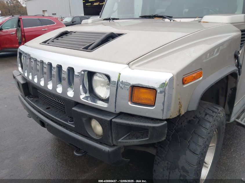 2003 Hummer H2 VIN: 5GRGN23U23H124253 Lot: 43880437