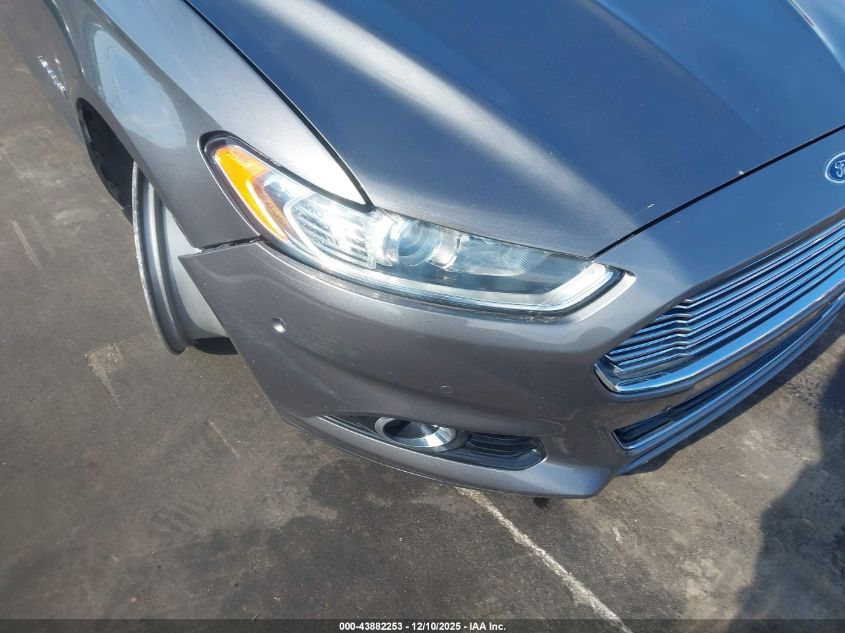 2014 Ford Fusion Hybrid Titanium VIN: 3FA6P0RUXER107209 Lot: 43882253