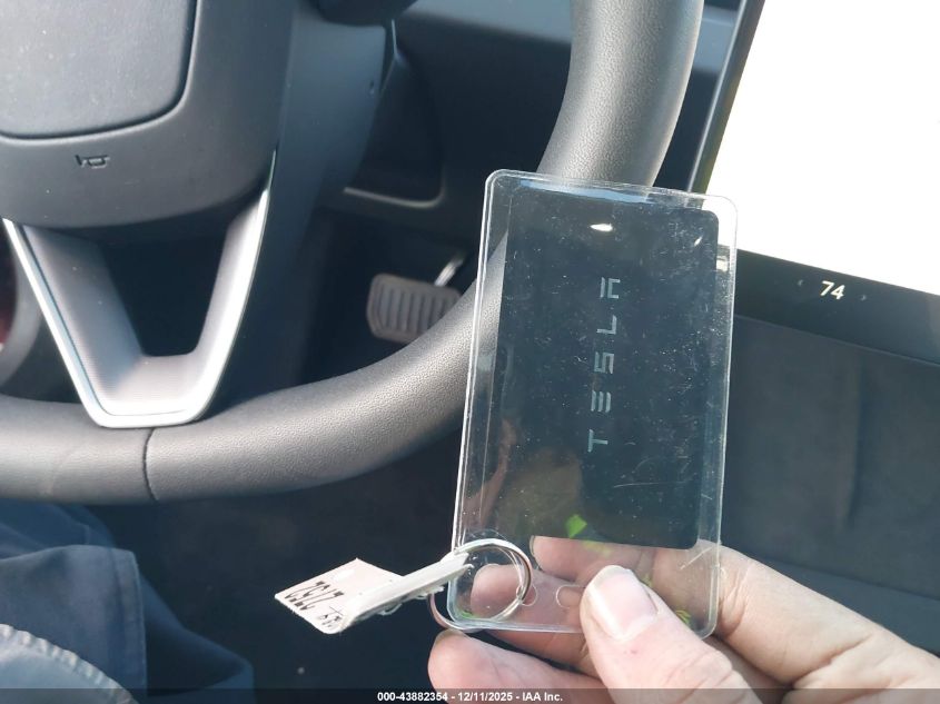 2024 Tesla Model 3 Long Range Dual Motor All-Wheel Drive VIN: 5YJ3E1EB5RF821303 Lot: 43882354