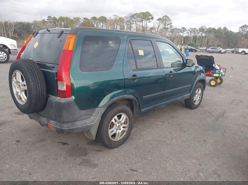 JHLRD78834C034990 2004 HONDA CR-V photo no. 4