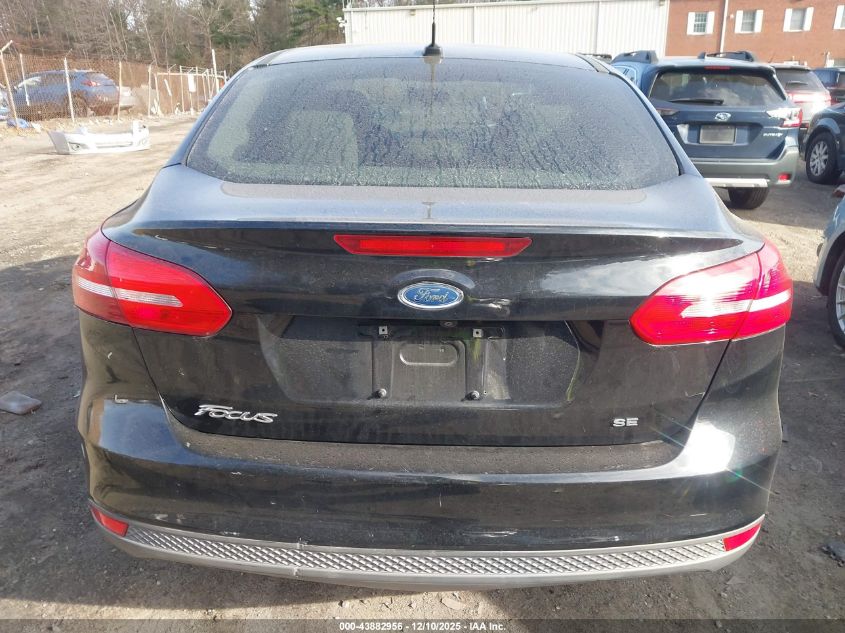 2018 Ford Focus Se VIN: 1FADP3F24JL252802 Lot: 43882956