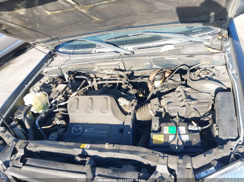 2002 Mazda Tribute Es V6/Lx V6 VIN: 4F2YU09162KM62007 Lot: 43883183