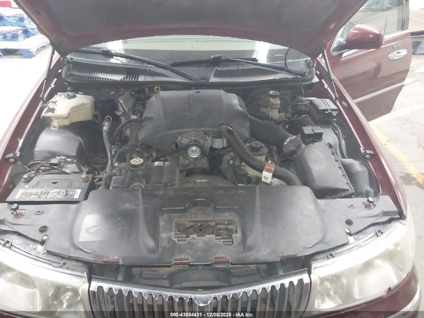 2001 Lincoln Town Car Signature VIN: 1LNHM82W51Y710906 Lot: 43884431