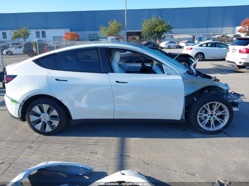 2023 Tesla Model Y Awd/Long Range Dual Motor All-Wheel Drive VIN: 7SAYGDEE2PF613276 Lot: 43886266