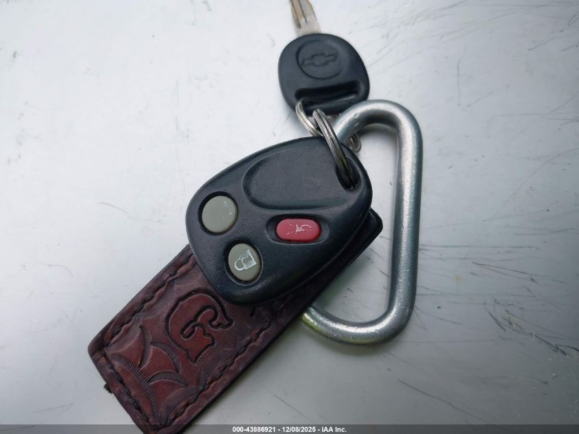 2003 Chevrolet Tahoe Ls VIN: 1GNEC13V13J136900 Lot: 43886921