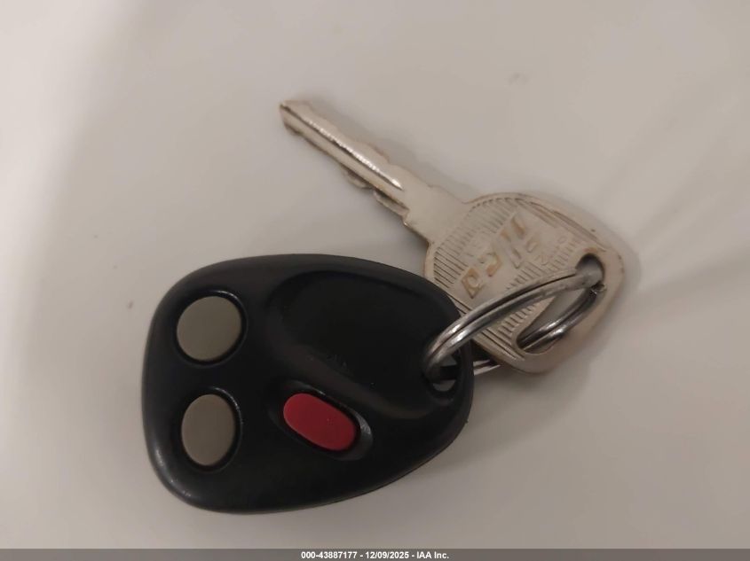 2004 Chevrolet Tahoe Lt VIN: 1GNEC13T24R203697 Lot: 43887177