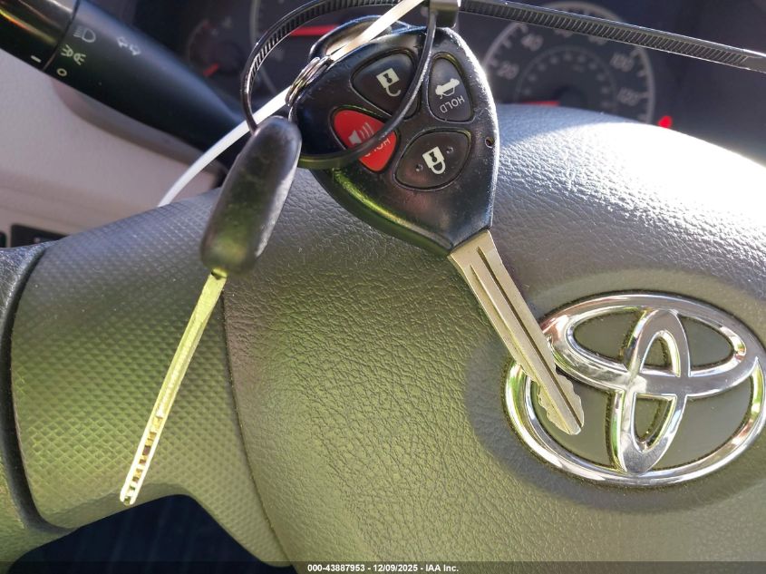 2009 Toyota Corolla Le VIN: JTDBL40E899027054 Lot: 43887953