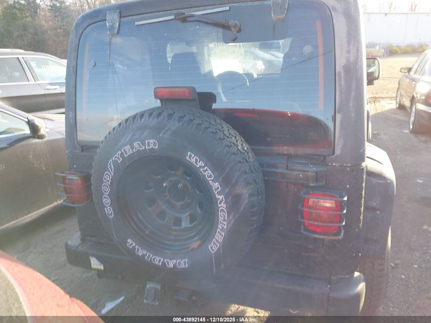 2003 Jeep Wrangler Sport VIN: 1J4FA49S13P312580 Lot: 43892145