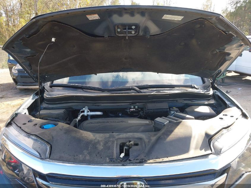 2018 Honda Pilot Touring VIN: 5FNYF5H99JB014175 Lot: 43893570