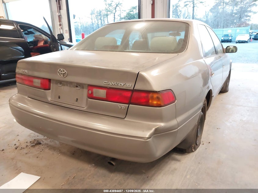 4T1BF22K9VU033446 1997 TOYOTA CAMRY photo no. 4