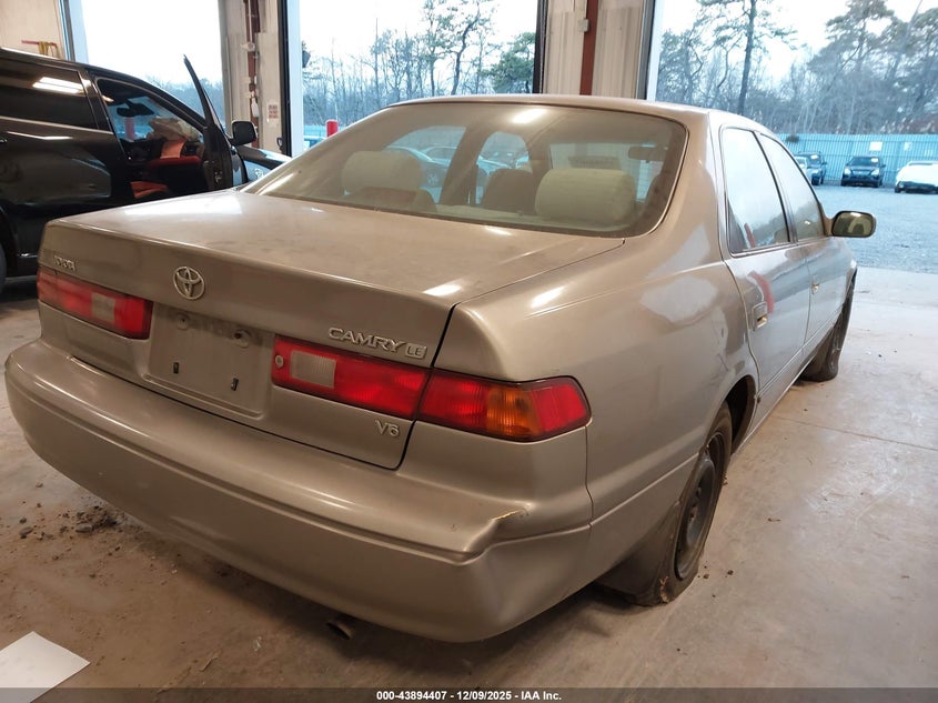 4T1BF22K9VU033446 1997 TOYOTA CAMRY photo no. 6