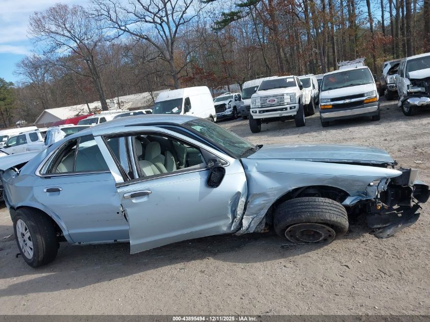 2005 Mercury Grand Marquis Gs VIN: 2MEFM74W55X673721 Lot: 43895494