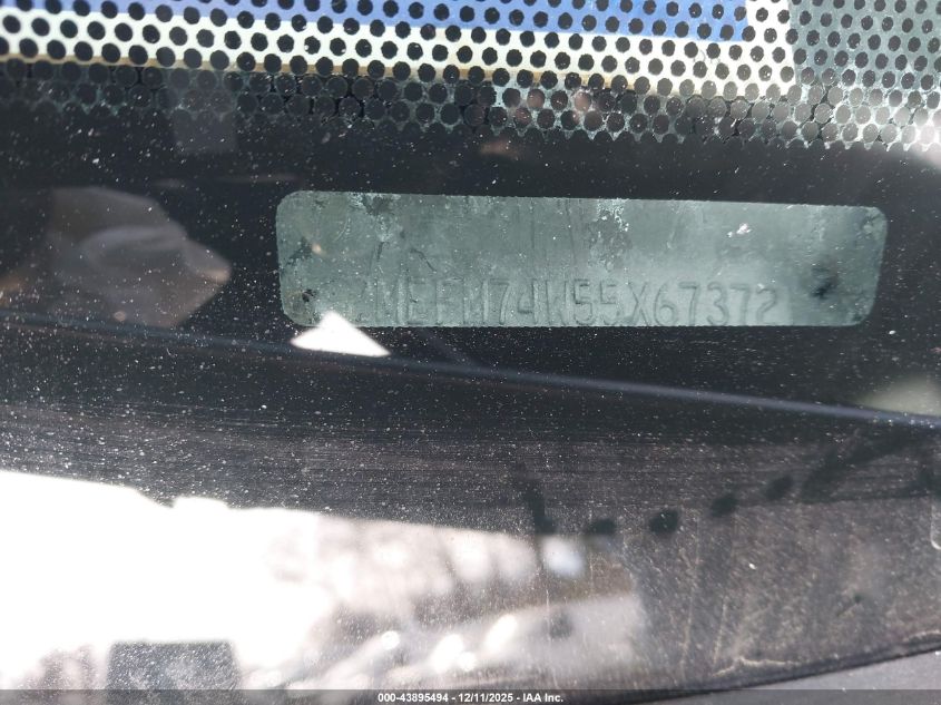 2005 Mercury Grand Marquis Gs VIN: 2MEFM74W55X673721 Lot: 43895494