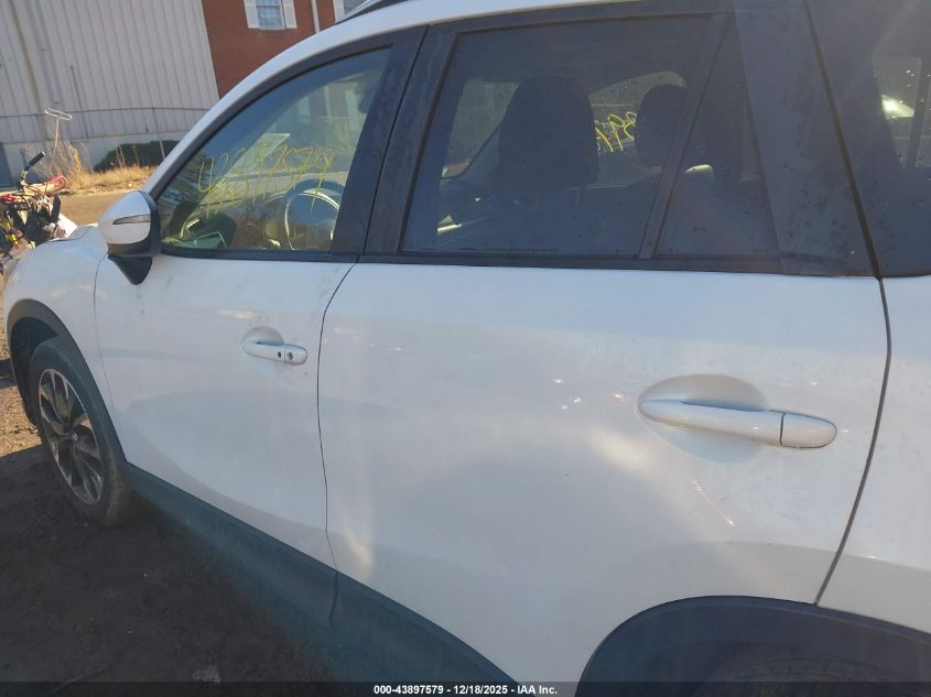 2016 Mazda Cx-5 Grand Touring VIN: JM3KE4DYXG0858823 Lot: 43897579