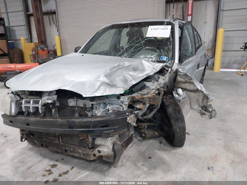 2002 Hyundai Accent Gl VIN: KMHCG45C62U341171 Lot: 43897889