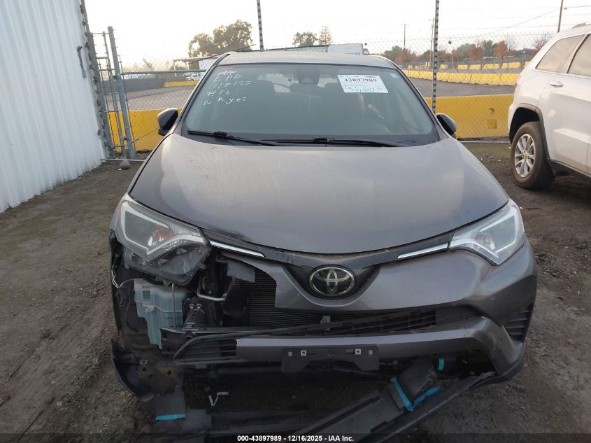 2018 Toyota Rav4 Le VIN: JTMBFREV0JJ243318 Lot: 43897989