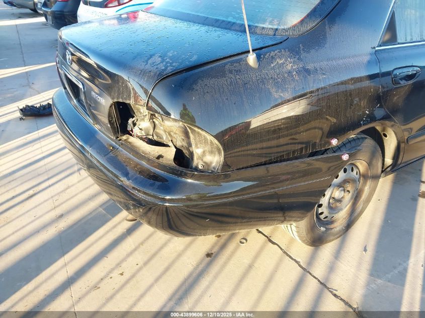 1999 Mazda 626 Es/Lx VIN: 1YVGF22C8X5834315 Lot: 43899606