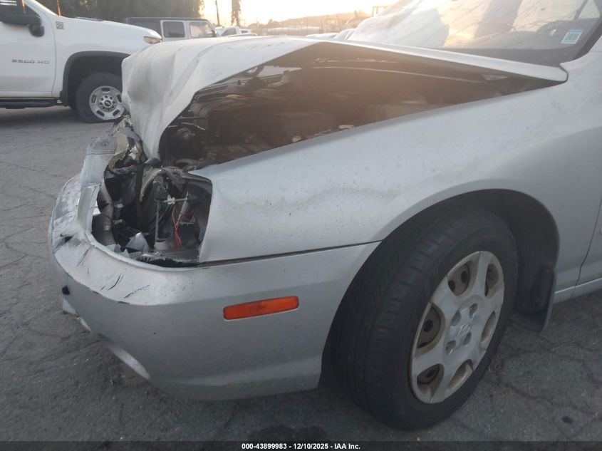 2003 Hyundai Elantra Gls/Gt VIN: KMHDN45D63U563715 Lot: 43899983