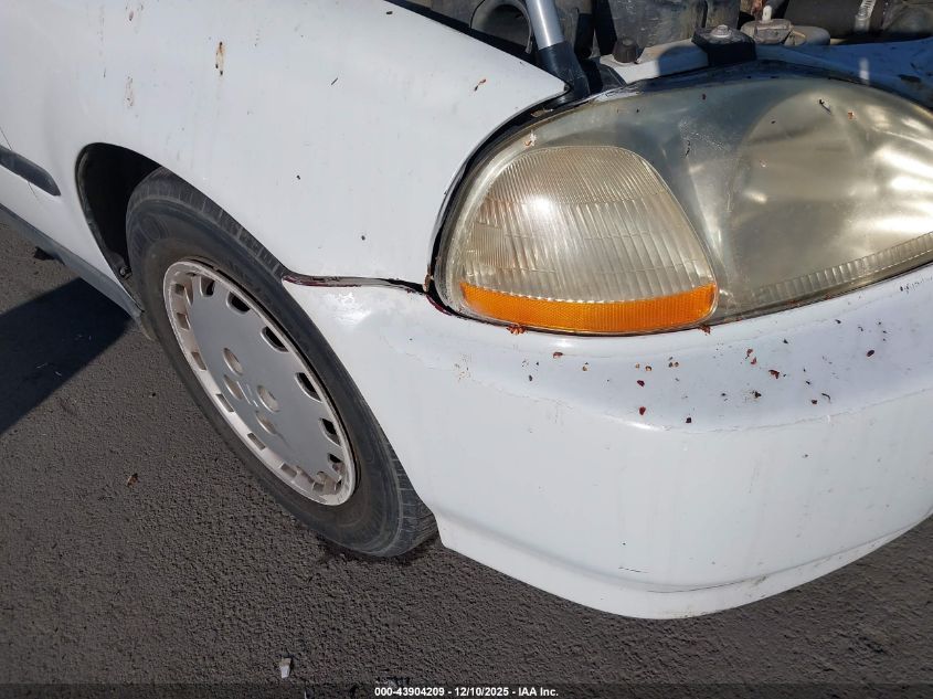 1997 Honda Civic Dx VIN: 2HGEJ6623VH574529 Lot: 43904209