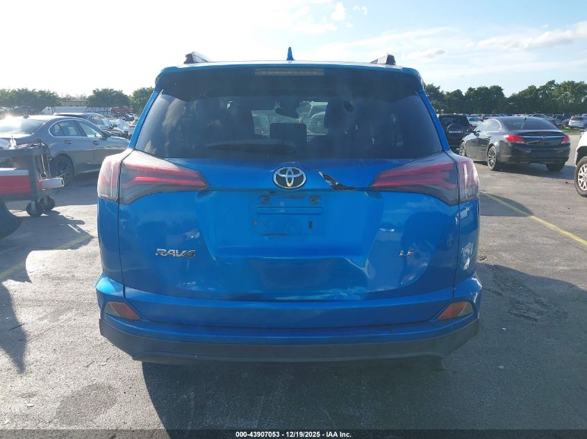 2018 Toyota Rav4 Le VIN: JTMZFREV9JJ15599 Lot: 43907053