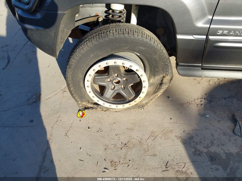 2004 Jeep Grand Cherokee Overland VIN: 1J8GW68J74C299870 Lot: 43909172