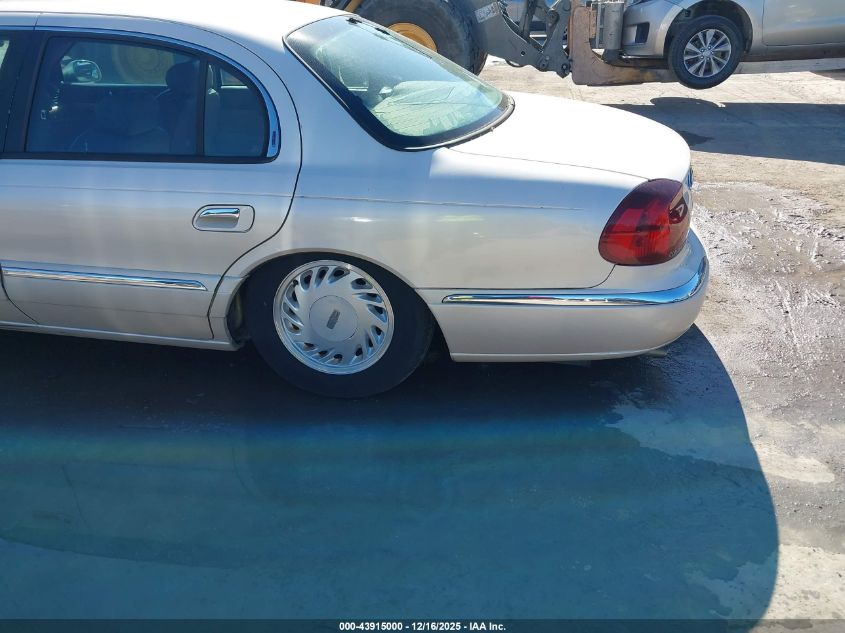 1998 Lincoln Continental VIN: 1LNFM97V2WY738067 Lot: 43915000