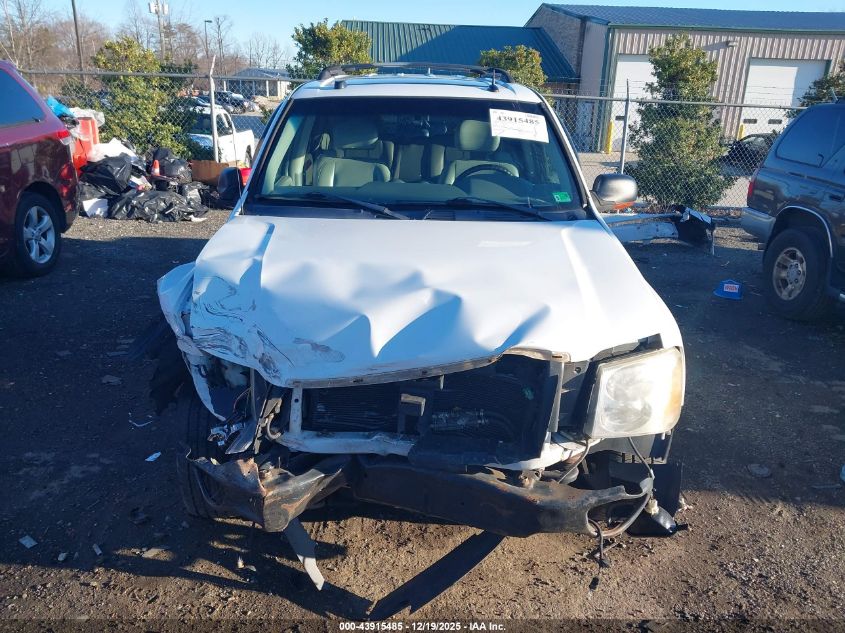 2005 GMC Envoy Slt VIN: 1GKDT13S652307779 Lot: 43915485