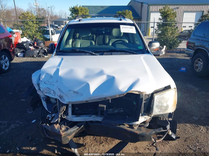 2005 GMC Envoy Slt VIN: 1GKDT13S652307779 Lot: 43915485